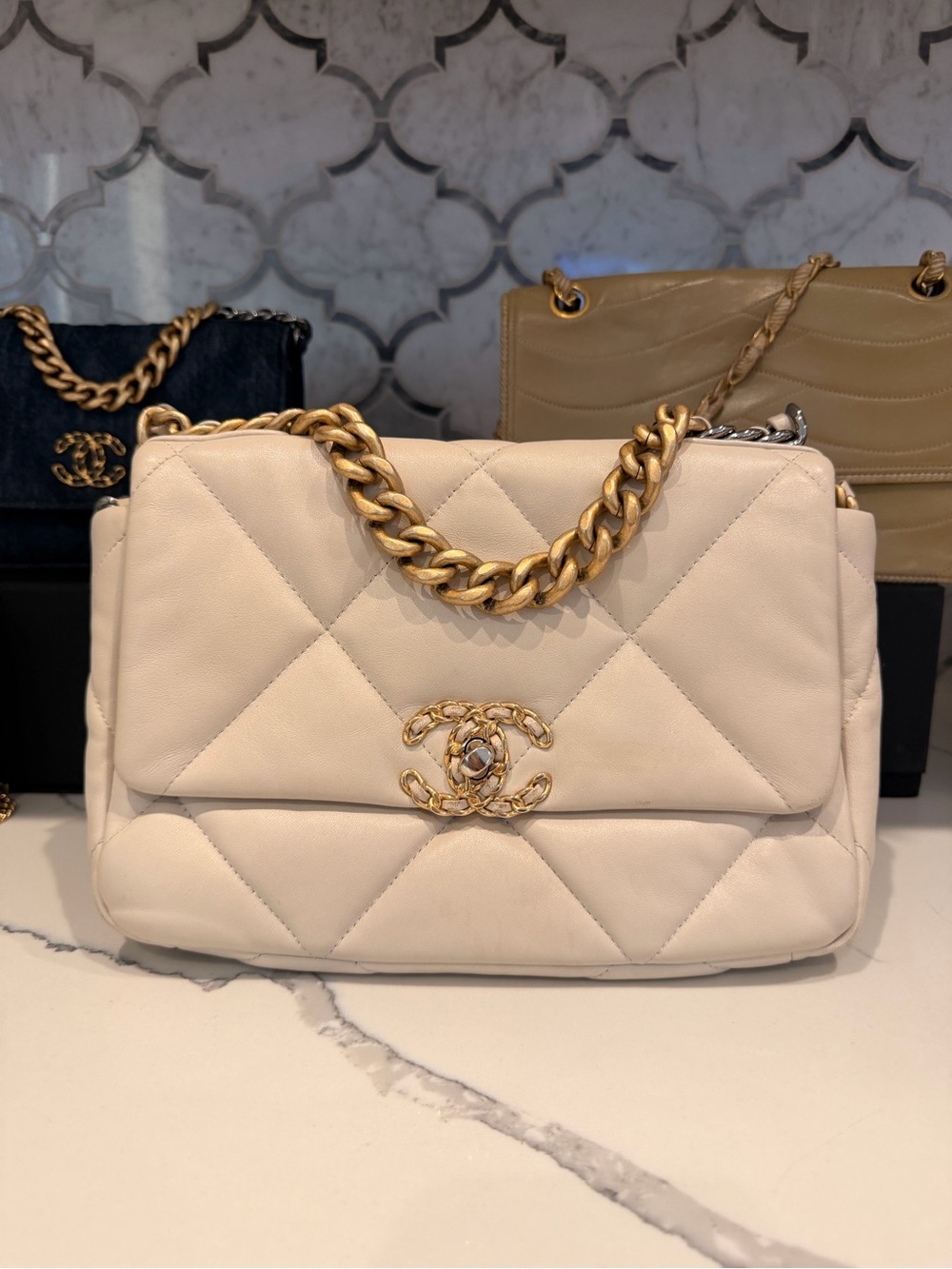 CHANEL 19 Medium quilted lambskin in light beige